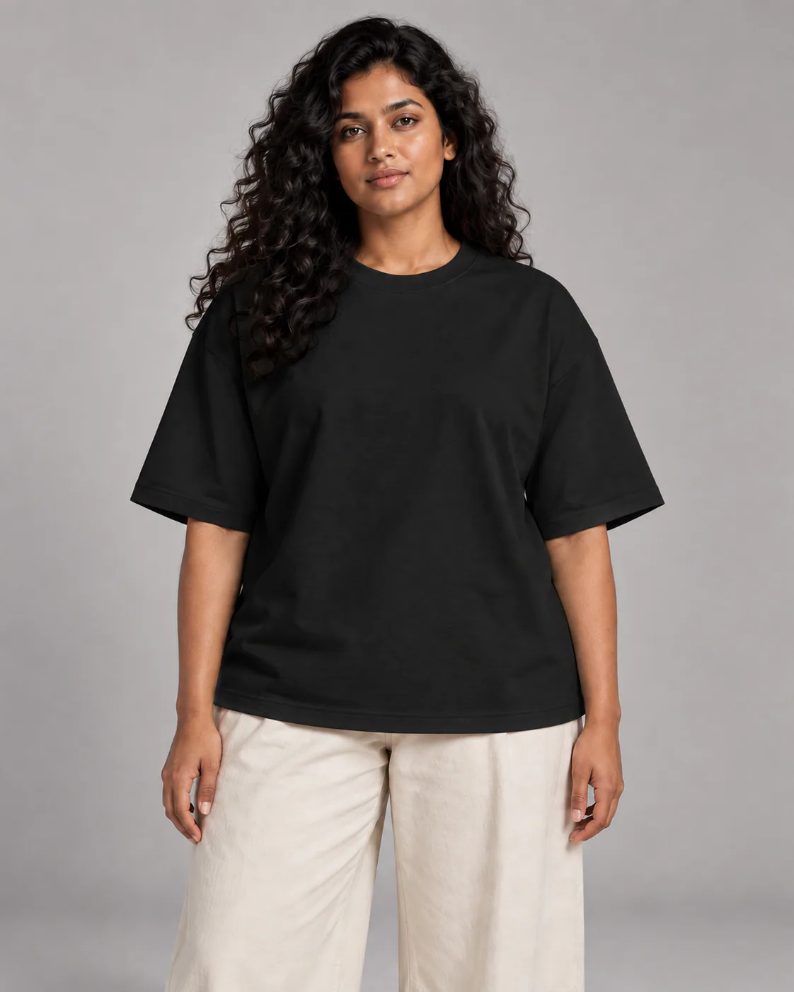 Female model wearing Solid Black